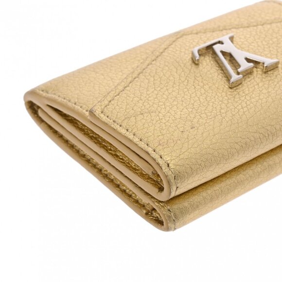 LOUIS VUITTON Gold purse - Picture 4 of 12